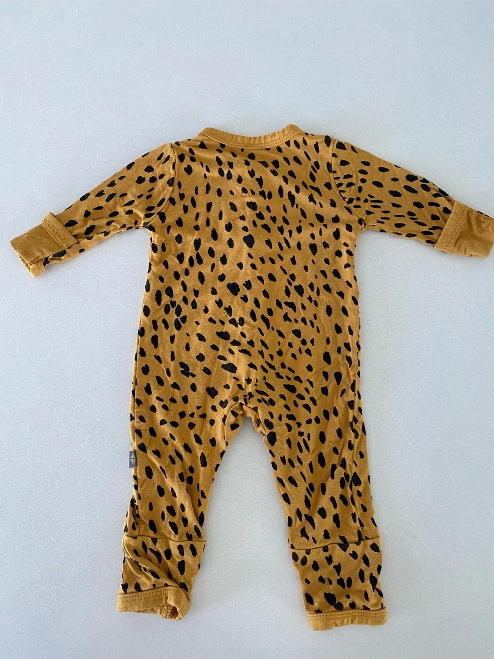 Kyte Long Sleeve One-Piece in Mustard with Black Spot Print